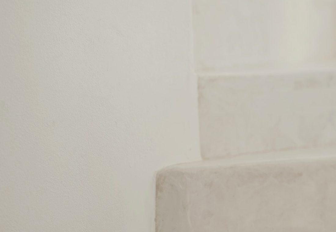 Limewashed plaster in soft light